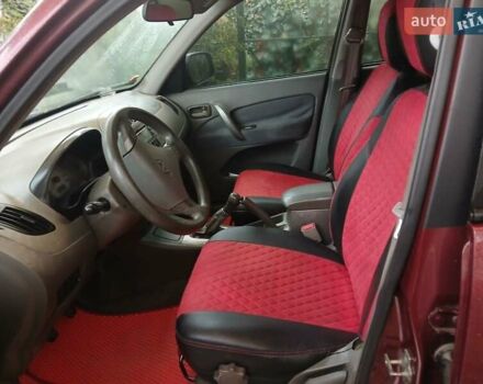 Червоний Чері Тігго, об'ємом двигуна 2 л та пробігом 132 тис. км за 3700 $, фото 6 на Automoto.ua