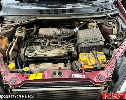 Червоний Чері Тігго, об'ємом двигуна 2 л та пробігом 200 тис. км за 3800 $, фото 7 на Automoto.ua