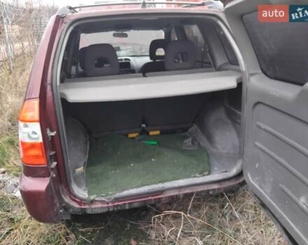 Червоний Чері Тігго, об'ємом двигуна 2 л та пробігом 156 тис. км за 2000 $, фото 5 на Automoto.ua