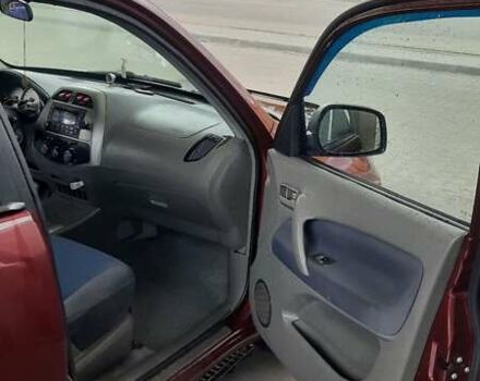 Червоний Чері Тігго, об'ємом двигуна 2 л та пробігом 242 тис. км за 3500 $, фото 30 на Automoto.ua