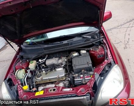 Красный Чери Тигго, объемом двигателя 2.4 л и пробегом 1000 тыс. км за 4000 $, фото 1 на Automoto.ua