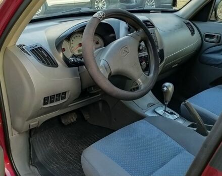 Красный Чери Тигго, объемом двигателя 2.4 л и пробегом 104 тыс. км за 3950 $, фото 9 на Automoto.ua