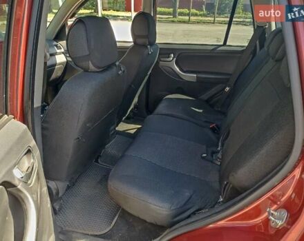 Красный Чери Тигго, объемом двигателя 1.6 л и пробегом 70 тыс. км за 8500 $, фото 5 на Automoto.ua