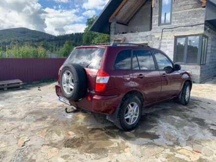 Красный Чери Тигго, объемом двигателя 2 л и пробегом 200 тыс. км за 3200 $, фото 1 на Automoto.ua