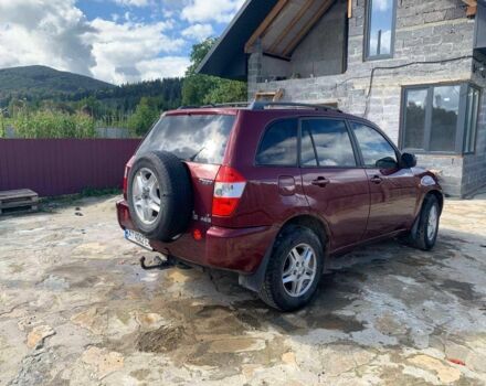 Красный Чери Тигго, объемом двигателя 2 л и пробегом 200 тыс. км за 3200 $, фото 1 на Automoto.ua