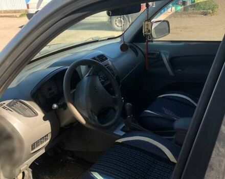 Серый Чери Тигго, объемом двигателя 2 л и пробегом 200 тыс. км за 4500 $, фото 7 на Automoto.ua