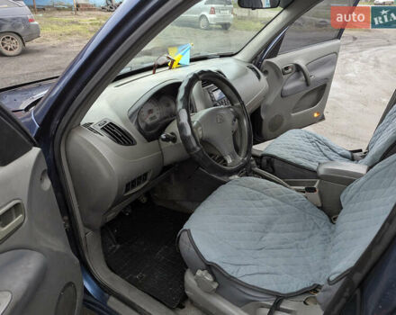 Синій Чері Тігго, об'ємом двигуна 2 л та пробігом 252 тис. км за 2600 $, фото 3 на Automoto.ua