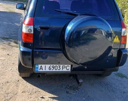 Синій Чері Тігго, об'ємом двигуна 2 л та пробігом 261 тис. км за 4800 $, фото 3 на Automoto.ua