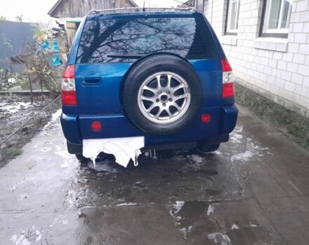 Синий Чери Тигго, объемом двигателя 2.4 л и пробегом 245 тыс. км за 3500 $, фото 12 на Automoto.ua