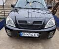 Черный Чери Tiggo 8, объемом двигателя 2.4 л и пробегом 193 тыс. км за 4900 $, фото 1 на Automoto.ua