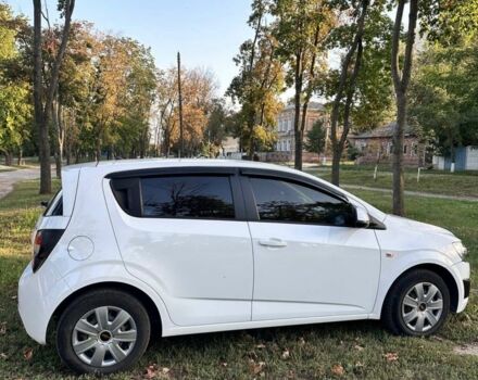 Белый Шевроле Авео, объемом двигателя 1.4 л и пробегом 158 тыс. км за 6500 $, фото 7 на Automoto.ua
