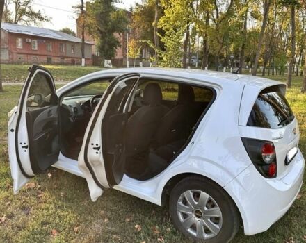Белый Шевроле Авео, объемом двигателя 1.4 л и пробегом 158 тыс. км за 6500 $, фото 9 на Automoto.ua