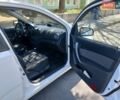 Белый Шевроле Авео, объемом двигателя 1.2 л и пробегом 212 тыс. км за 4600 $, фото 9 на Automoto.ua