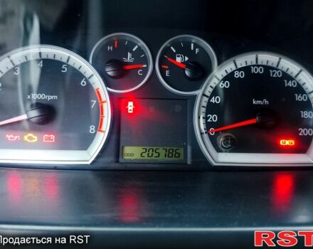 Белый Шевроле Авео, объемом двигателя 1.5 л и пробегом 205 тыс. км за 3400 $, фото 3 на Automoto.ua