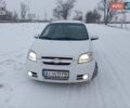 Белый Шевроле Авео, объемом двигателя 1.6 л и пробегом 222 тыс. км за 2999 $, фото 3 на Automoto.ua