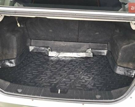 Белый Шевроле Авео, объемом двигателя 1.5 л и пробегом 260 тыс. км за 4000 $, фото 1 на Automoto.ua