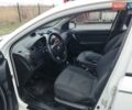 Белый Шевроле Авео, объемом двигателя 1.2 л и пробегом 255 тыс. км за 3709 $, фото 4 на Automoto.ua