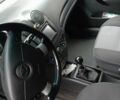 Белый Шевроле Авео, объемом двигателя 1.5 л и пробегом 370 тыс. км за 3500 $, фото 4 на Automoto.ua