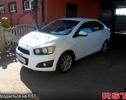 Белый Шевроле Авео, объемом двигателя 1.4 л и пробегом 150 тыс. км за 5000 $, фото 4 на Automoto.ua