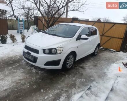 Белый Шевроле Авео, объемом двигателя 1.2 л и пробегом 250 тыс. км за 5000 $, фото 1 на Automoto.ua