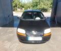 Черный Шевроле Авео, объемом двигателя 1.2 л и пробегом 230 тыс. км за 2210 $, фото 1 на Automoto.ua