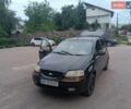 Черный Шевроле Авео, объемом двигателя 1.5 л и пробегом 280 тыс. км за 1999 $, фото 1 на Automoto.ua