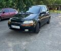 Черный Шевроле Авео, объемом двигателя 1.5 л и пробегом 275 тыс. км за 3000 $, фото 1 на Automoto.ua