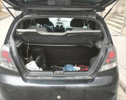 Черный Шевроле Авео, объемом двигателя 1.5 л и пробегом 143 тыс. км за 2000 $, фото 6 на Automoto.ua