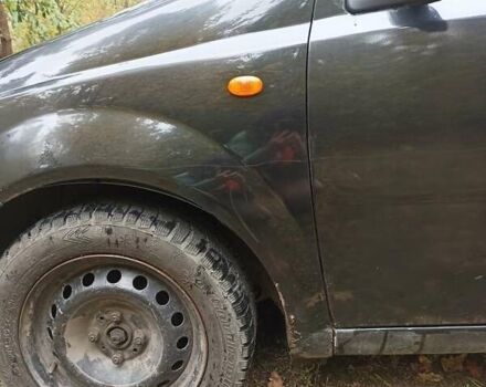 Черный Шевроле Авео, объемом двигателя 1.5 л и пробегом 216 тыс. км за 3500 $, фото 1 на Automoto.ua