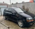 Черный Шевроле Авео, объемом двигателя 1.5 л и пробегом 250 тыс. км за 2000 $, фото 1 на Automoto.ua