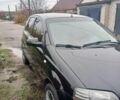 Черный Шевроле Авео, объемом двигателя 10 л и пробегом 185 тыс. км за 3500 $, фото 2 на Automoto.ua