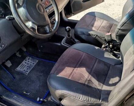 Чорний Шевроле Авео, об'ємом двигуна 1.5 л та пробігом 215 тис. км за 3400 $, фото 4 на Automoto.ua