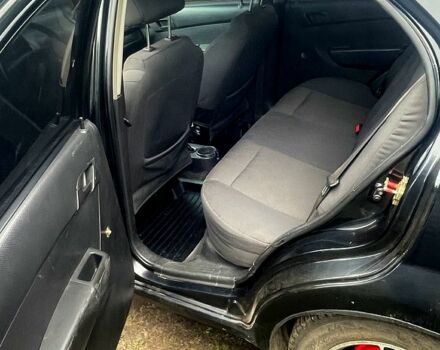 Черный Шевроле Авео, объемом двигателя 1.5 л и пробегом 312 тыс. км за 3100 $, фото 4 на Automoto.ua