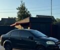Черный Шевроле Авео, объемом двигателя 1.5 л и пробегом 234 тыс. км за 2000 $, фото 1 на Automoto.ua