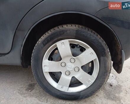 Черный Шевроле Авео, объемом двигателя 1.5 л и пробегом 244 тыс. км за 2300 $, фото 1 на Automoto.ua