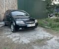 Черный Шевроле Авео, объемом двигателя 1.5 л и пробегом 225 тыс. км за 3200 $, фото 2 на Automoto.ua