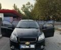 Черный Шевроле Авео, объемом двигателя 1.4 л и пробегом 178 тыс. км за 3611 $, фото 1 на Automoto.ua
