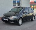 Черный Шевроле Авео, объемом двигателя 1.5 л и пробегом 220 тыс. км за 1999 $, фото 1 на Automoto.ua