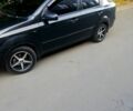 Черный Шевроле Авео, объемом двигателя 1.5 л и пробегом 260 тыс. км за 3800 $, фото 1 на Automoto.ua