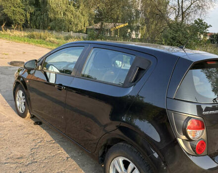 Чорний Шевроле Авео, об'ємом двигуна 1.4 л та пробігом 184 тис. км за 6500 $, фото 4 на Automoto.ua