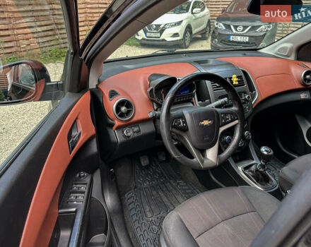 Чорний Шевроле Авео, об'ємом двигуна 1.4 л та пробігом 210 тис. км за 6800 $, фото 54 на Automoto.ua