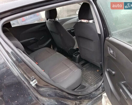 Чорний Шевроле Авео, об'ємом двигуна 1.23 л та пробігом 130 тис. км за 2250 $, фото 4 на Automoto.ua
