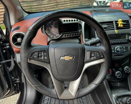 Чорний Шевроле Авео, об'ємом двигуна 1.4 л та пробігом 210 тис. км за 6800 $, фото 60 на Automoto.ua