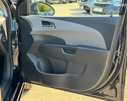 Черный Шевроле Авео, объемом двигателя 1.6 л и пробегом 135 тыс. км за 7690 $, фото 21 на Automoto.ua