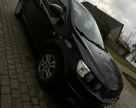 Черный Шевроле Авео, объемом двигателя 1.25 л и пробегом 191 тыс. км за 6000 $, фото 2 на Automoto.ua