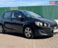 Черный Шевроле Авео, объемом двигателя 1.6 л и пробегом 124 тыс. км за 6350 $, фото 1 на Automoto.ua