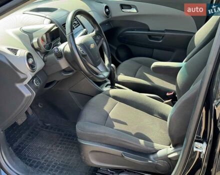 Черный Шевроле Авео, объемом двигателя 1.6 л и пробегом 135 тыс. км за 7690 $, фото 12 на Automoto.ua