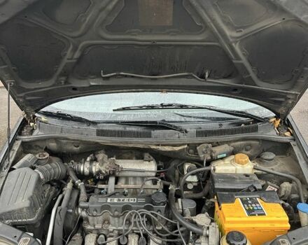 Черный Шевроле Авео, объемом двигателя 1.5 л и пробегом 200 тыс. км за 1450 $, фото 5 на Automoto.ua