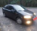 Черный Шевроле Авео, объемом двигателя 1.5 л и пробегом 200 тыс. км за 3200 $, фото 1 на Automoto.ua