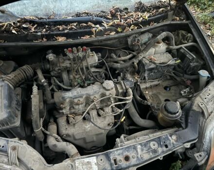 Черный Шевроле Авео, объемом двигателя 1.5 л и пробегом 200 тыс. км за 639 $, фото 2 на Automoto.ua